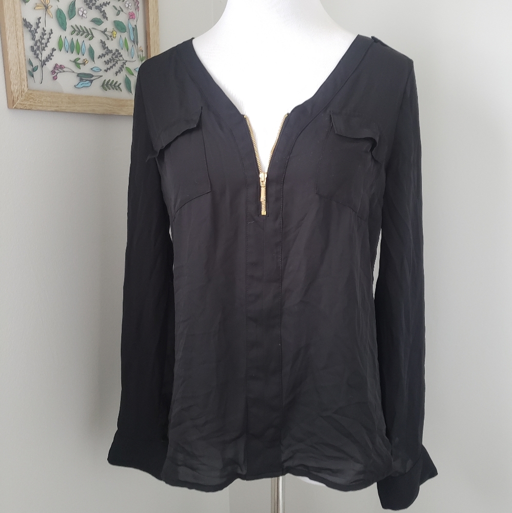 Black long sleeved blouse with gold details
